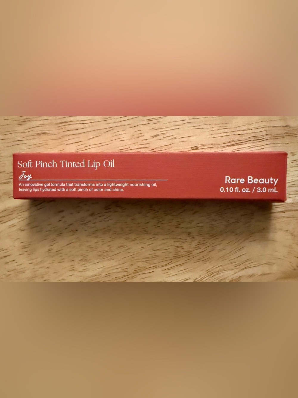 Rare Beauty Soft Pinch Tinted Lip Oil in Joy - Warm Coral Red
